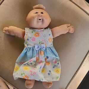 Vintage collectable Cabbage Patch Kids Doll in Floral Dress